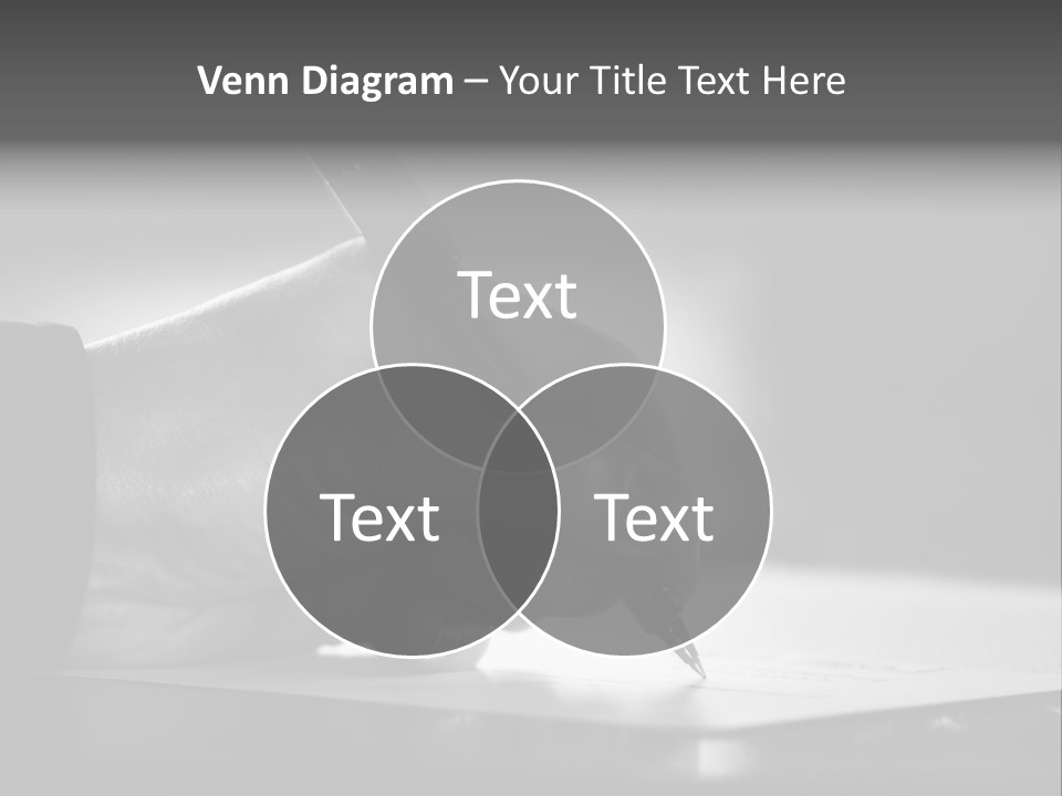 Hand At Desk Signing Paperwork/Document/ Contract Or Making Notes - Black And White Image. PowerPoint Template