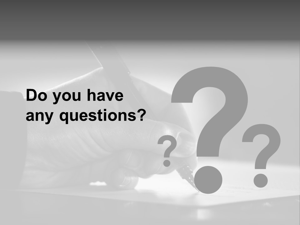 Hand At Desk Signing Paperwork/Document/ Contract Or Making Notes - Black And White Image. PowerPoint Template