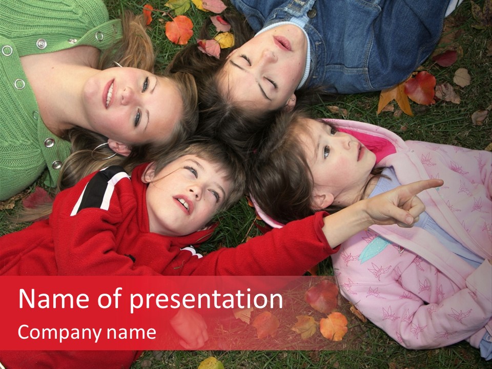 Children Relaxing On Autumn Grass PowerPoint Template