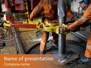 Two Roughnecks Breaking A Connection With Help From Tongs. Offshore Oil Rig. PowerPoint Template