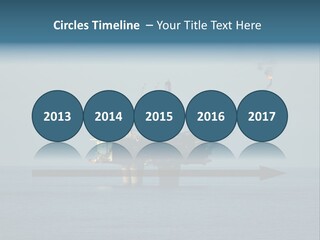 An Oil Rig In The Middle Of The Ocean PowerPoint Template