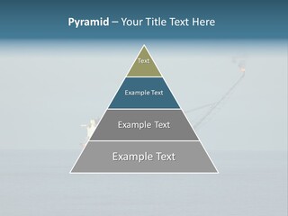 An Oil Rig In The Middle Of The Ocean PowerPoint Template