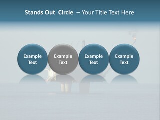 An Oil Rig In The Middle Of The Ocean PowerPoint Template