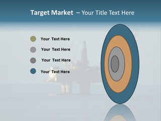 An Oil Rig In The Middle Of The Ocean PowerPoint Template