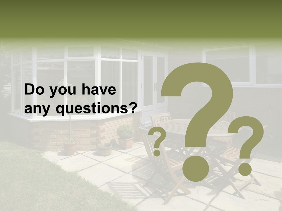 A Patio With A Table And Chairs In Front Of A House PowerPoint Template