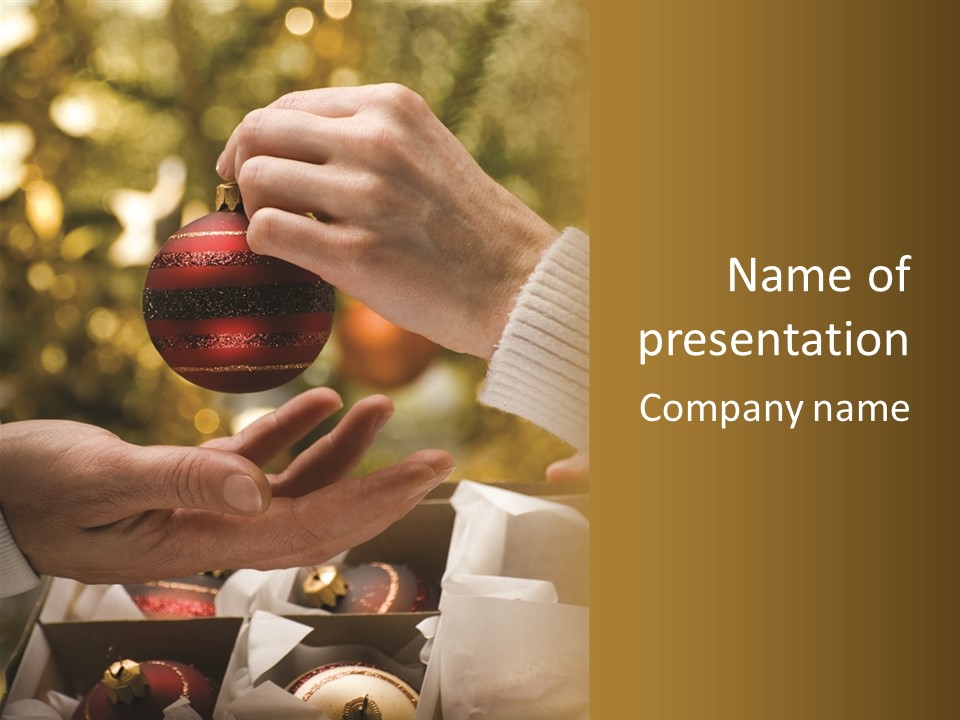 Female Giving Christmas Ball To Male Close Up PowerPoint Template