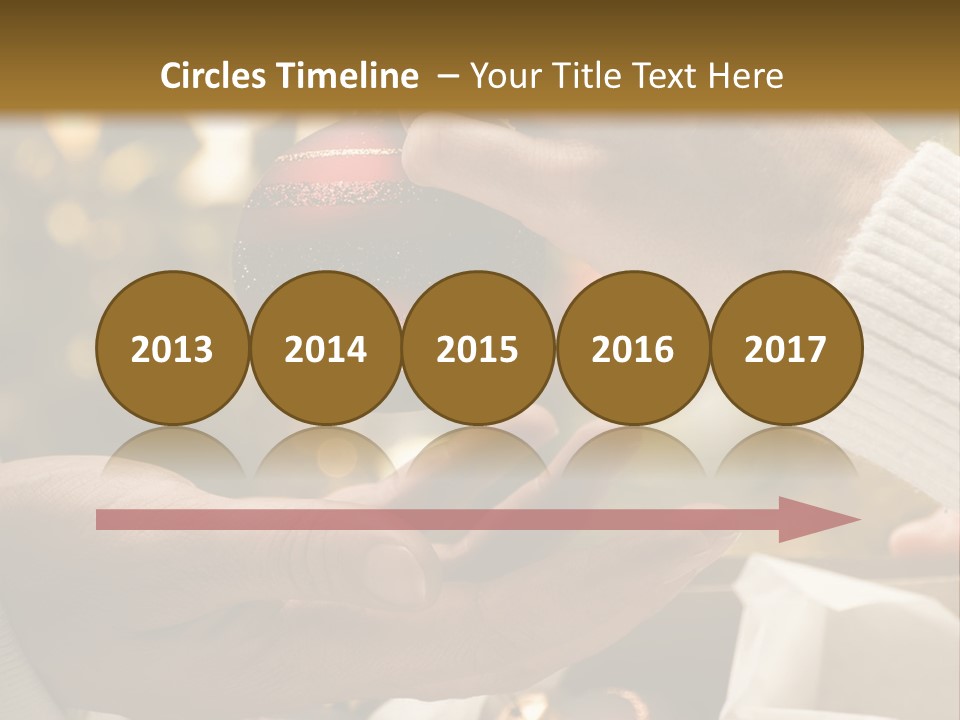 Female Giving Christmas Ball To Male Close Up PowerPoint Template