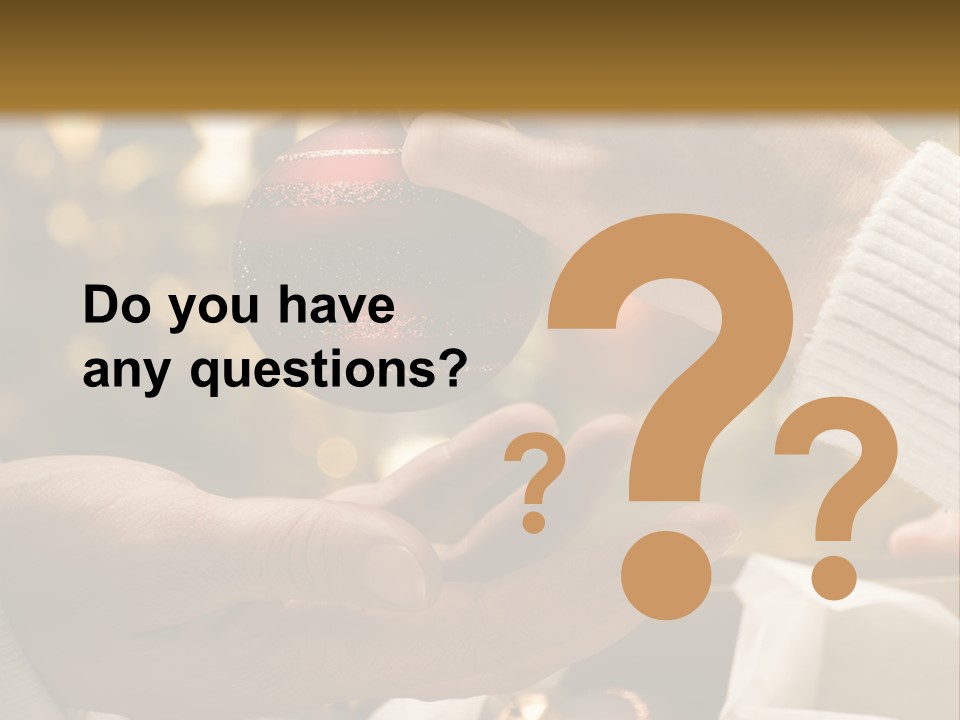 Female Giving Christmas Ball To Male Close Up PowerPoint Template