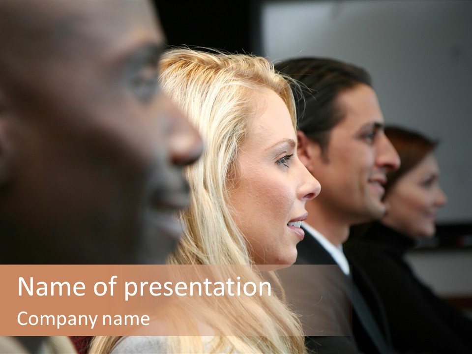 Business Team Sitting In A Meeting At Work PowerPoint Template