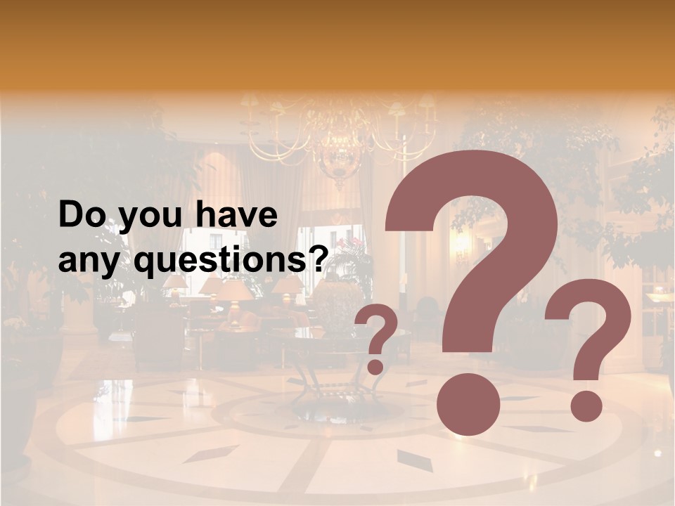 A Large Room With A Chandelier And A Chandelier Hanging From The PowerPoint Template