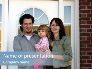 Family At The Front Door Of Their New Home PowerPoint Template