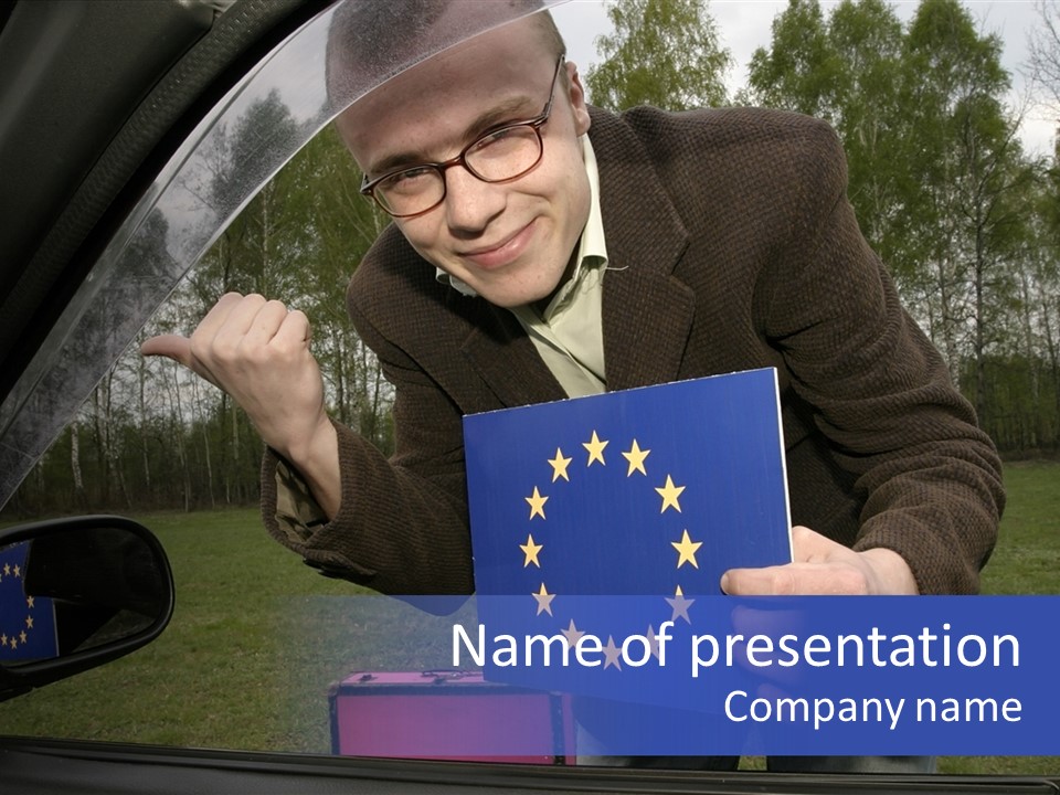 A Man Holding A Blue Box With A European Flag On It PowerPoint Template
