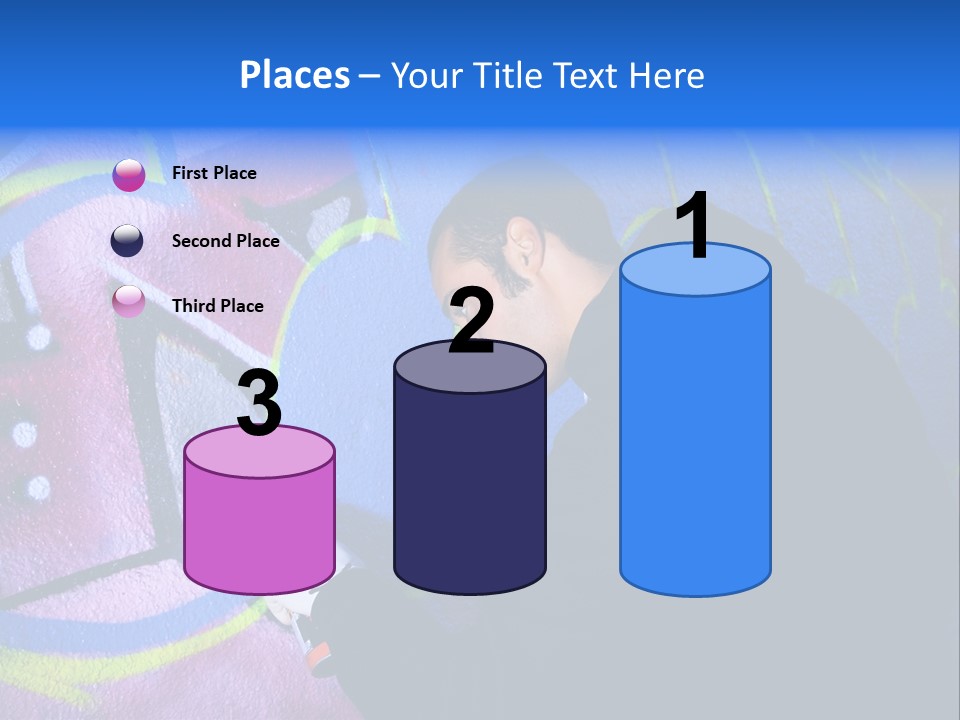 A Man In A Hoodie Writing On A Wall With Graffiti PowerPoint Template