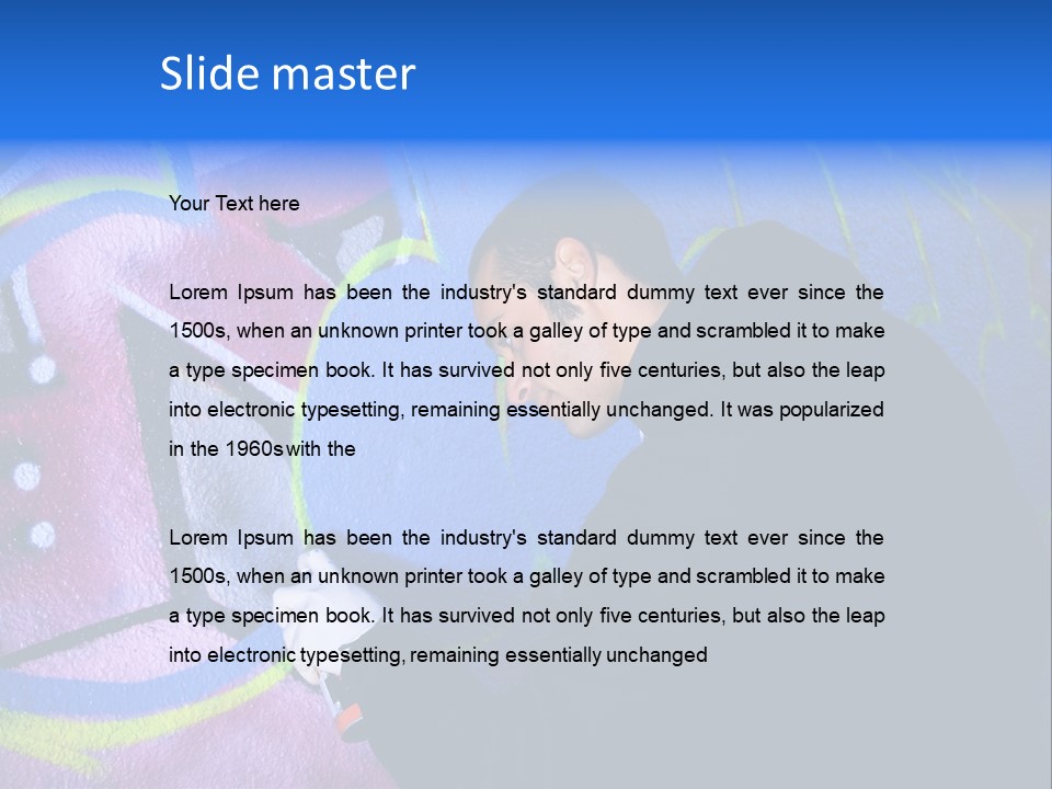 A Man In A Hoodie Writing On A Wall With Graffiti PowerPoint Template