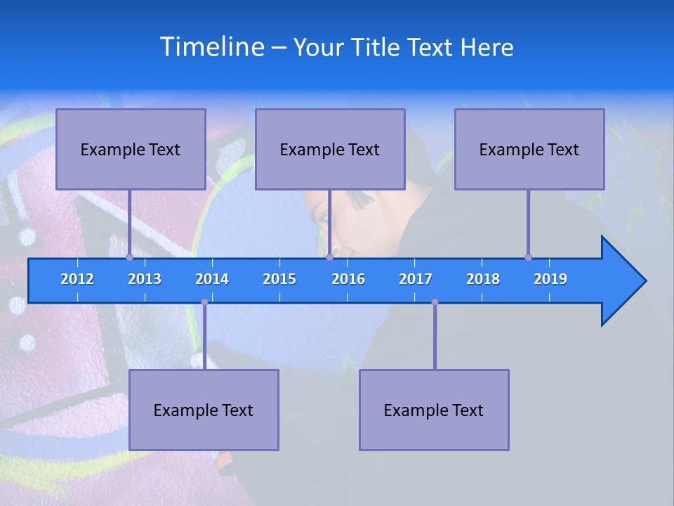 A Man In A Hoodie Writing On A Wall With Graffiti PowerPoint Template