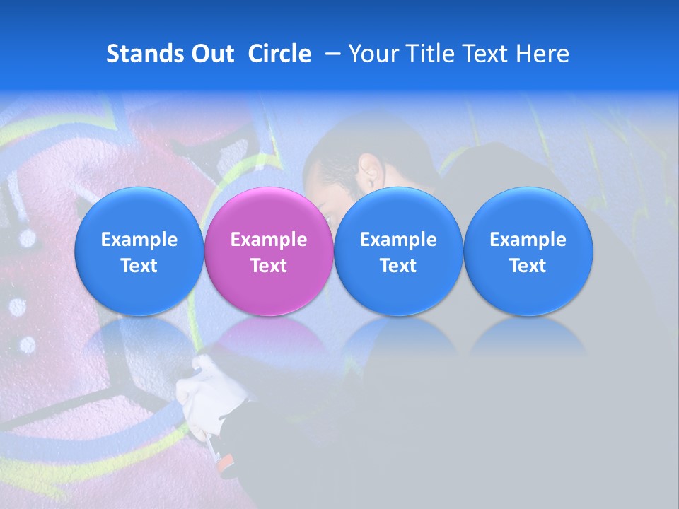 A Man In A Hoodie Writing On A Wall With Graffiti PowerPoint Template