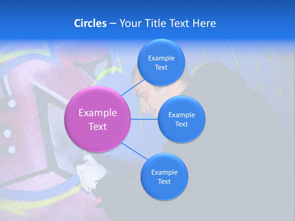 A Man In A Hoodie Writing On A Wall With Graffiti PowerPoint Template