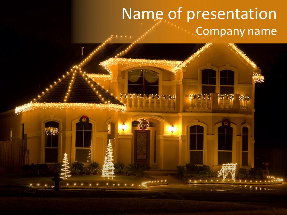 House Decorated And Lighted For Christmas At Night PowerPoint Template