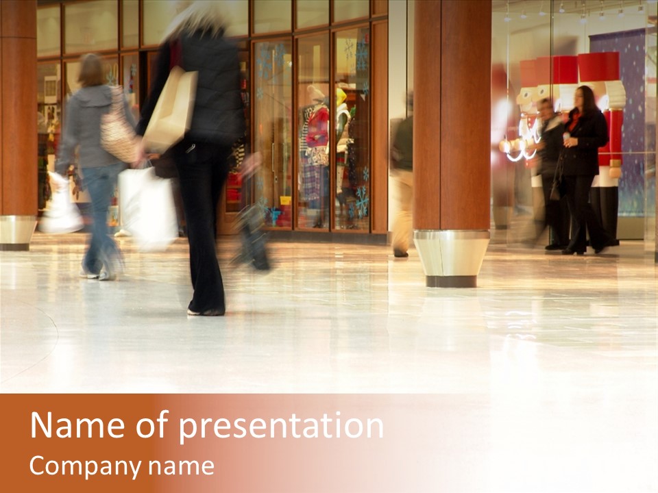 People Shopping Inside A Mall (Focus Is More On The Front Areas & Sharpness Is A Little Off To Highlight Motion & Obscure Logos/Faces, Photo Composition Allows You To Add Text & Other Contents Easily) PowerPoint Template