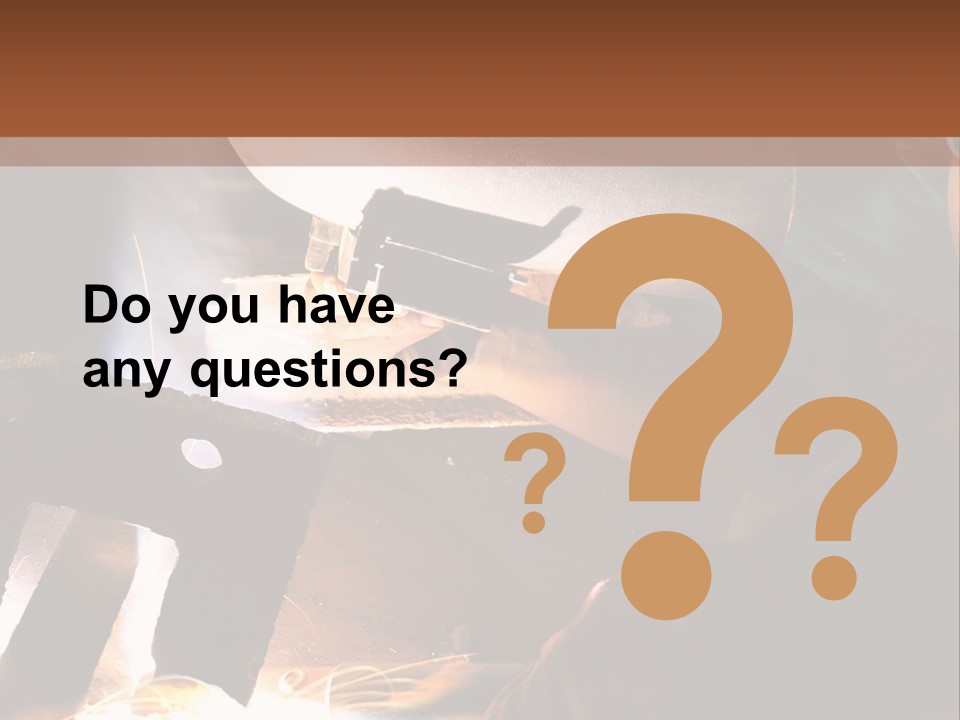 A Person Working On A Piece Of Metal With Sparks PowerPoint Template