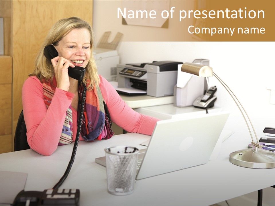 Woman In Home Office On Phone PowerPoint Template