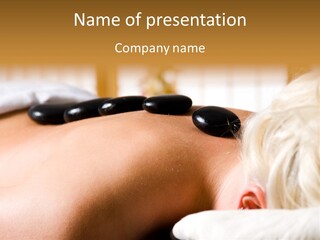 Woman Getting A Hot Stone Massage At A Day Spa PowerPoint Template