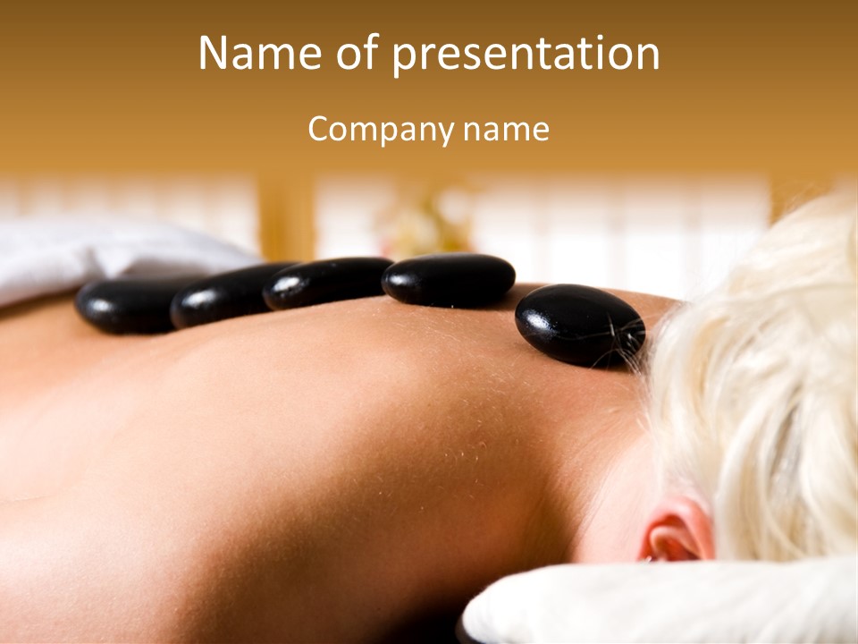 Woman Getting A Hot Stone Massage At A Day Spa PowerPoint Template