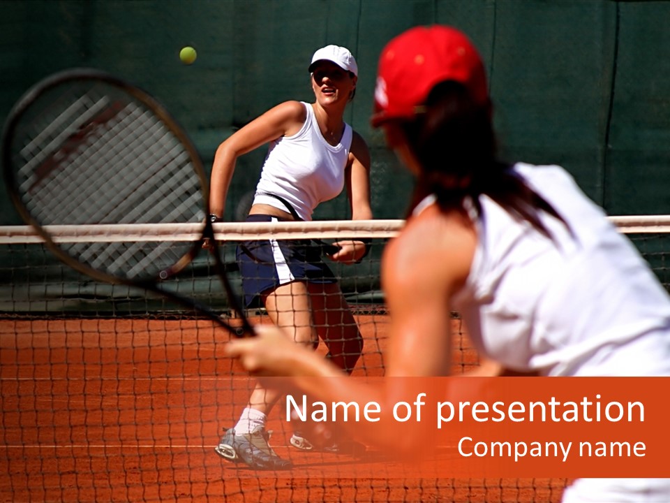 Two Young Sporty Female Tennis Players Enjoying A Game In The Sun On The Costa Del Sol PowerPoint Template
