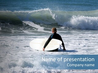 Surfer Walking Out To Sea Carrying Baord Under His Arm PowerPoint Template