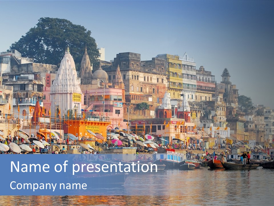 Boats And Reflection In Water At The Main Ghat In Varanasi On A Sunny Day PowerPoint Template