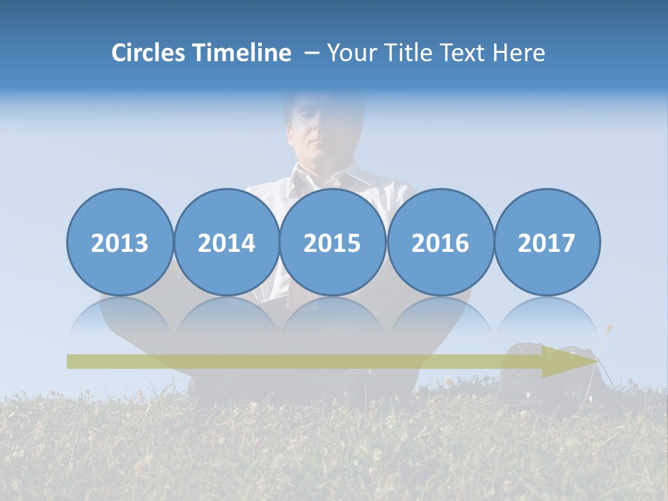 Businessman Wearing White Shirt And Tie Meditating On Grass With His Shoes Off Over Clear Blue Sky PowerPoint Template