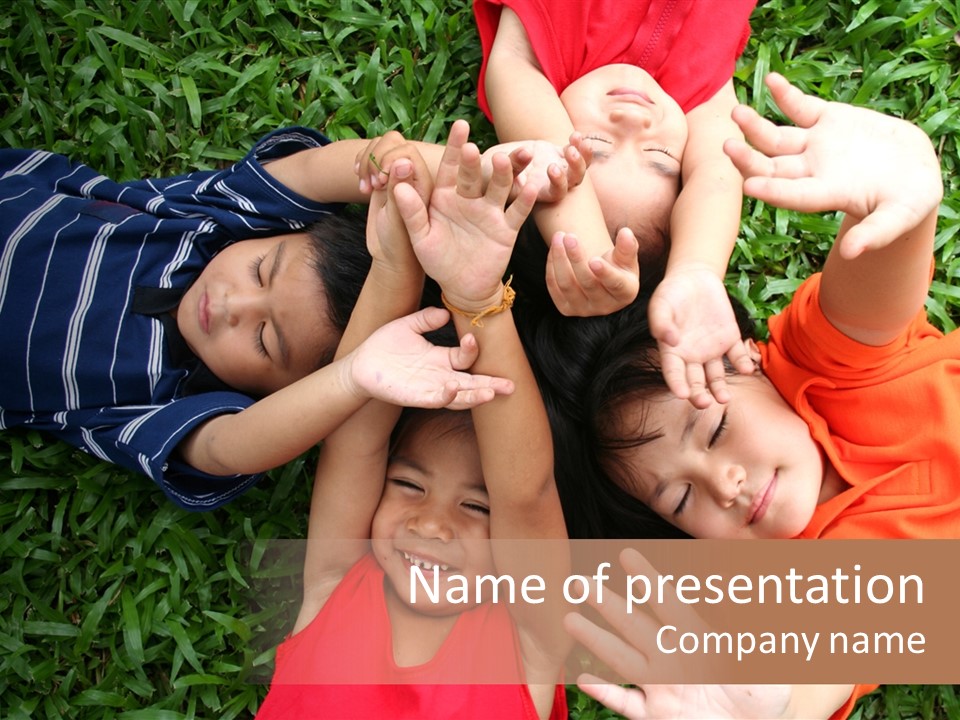 Four Children Playing In The Park. PowerPoint Template