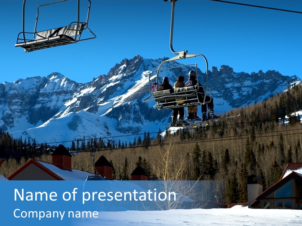A Group Of People Riding A Ski Lift Over A Snow Covered Mountain PowerPoint Template