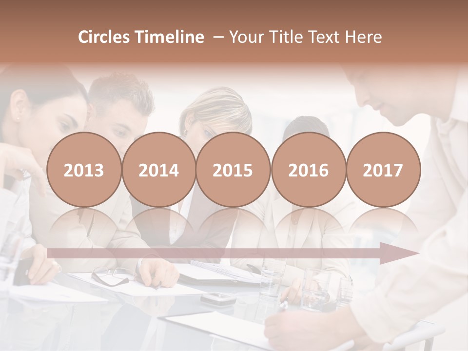 Businessman Leaning On Desk, Explaining To Four Colleagues Sitting. PowerPoint Template