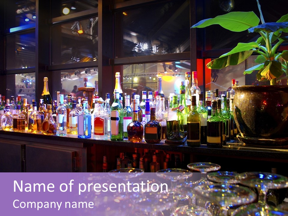 A Bar Filled With Lots Of Bottles Of Liquor PowerPoint Template