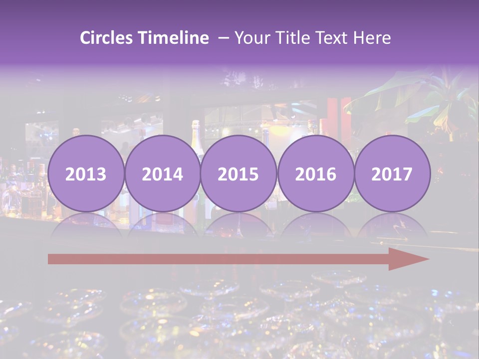 A Bar Filled With Lots Of Bottles Of Liquor PowerPoint Template