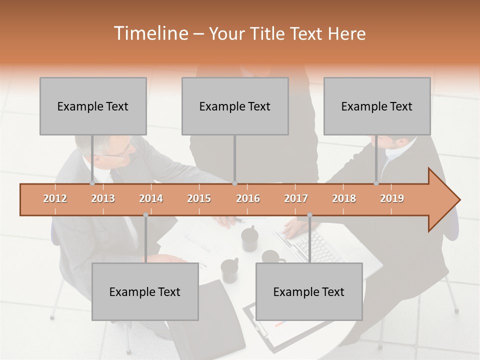 A Group Of Business People Shaking Hands Over A Table PowerPoint Template