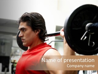 Man Lifting Weights At The Gym Looking Serious PowerPoint Template