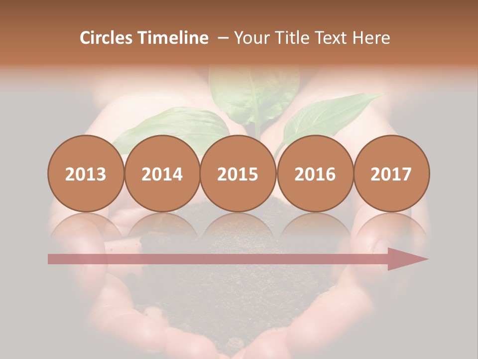 Hands Holding Sapling In Soil PowerPoint Template