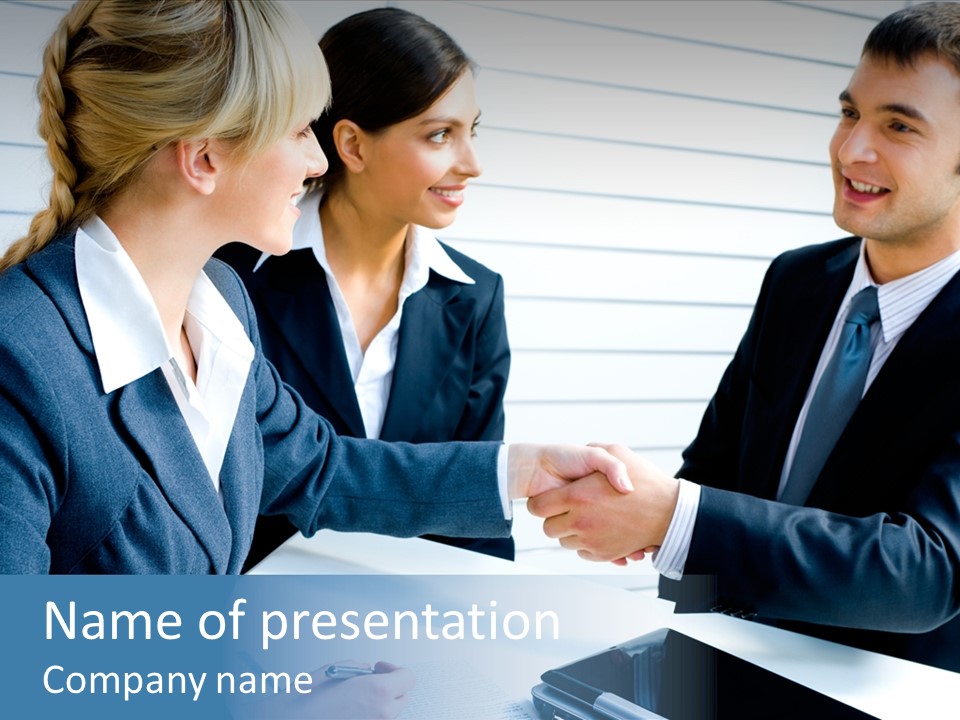 A Group Of Business People Shaking Hands PowerPoint Template