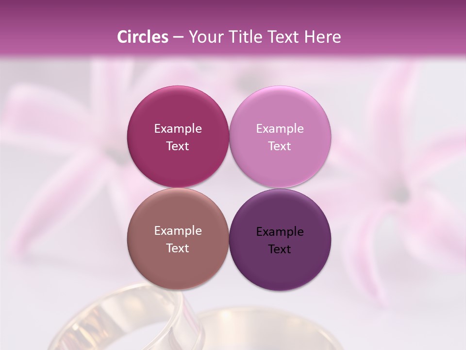 Two Gold Wedding Rings Sitting On Top Of A Table PowerPoint Template