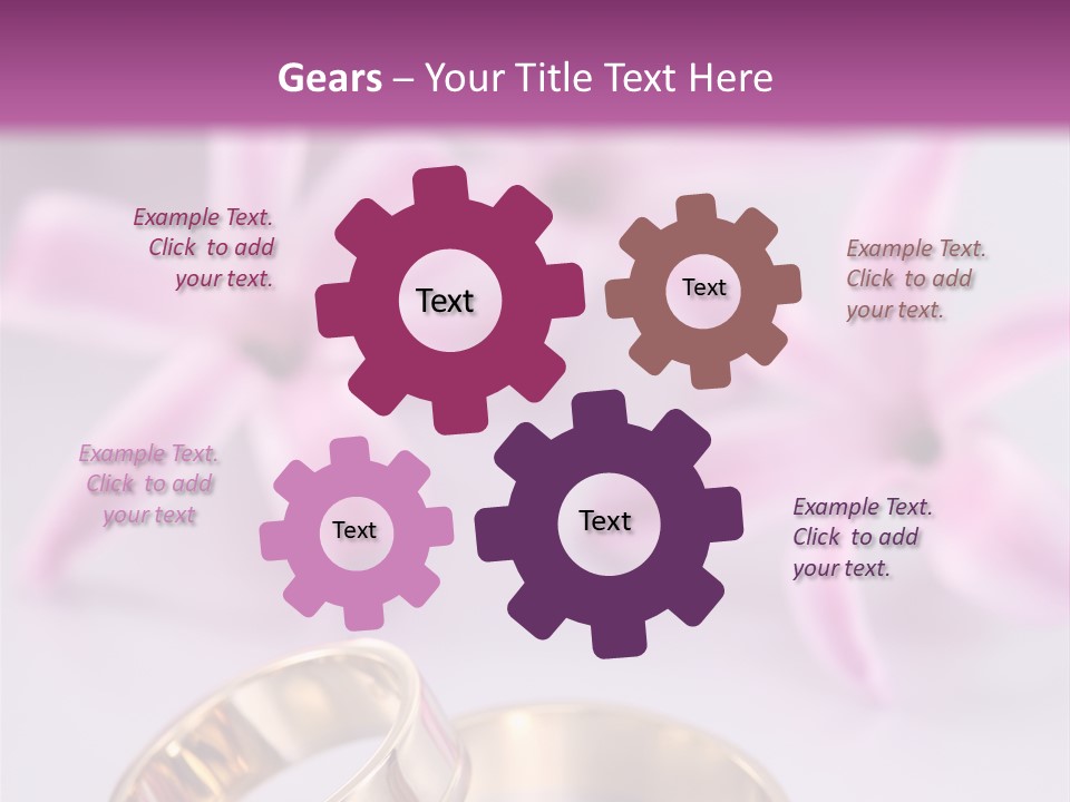 Two Gold Wedding Rings Sitting On Top Of A Table PowerPoint Template