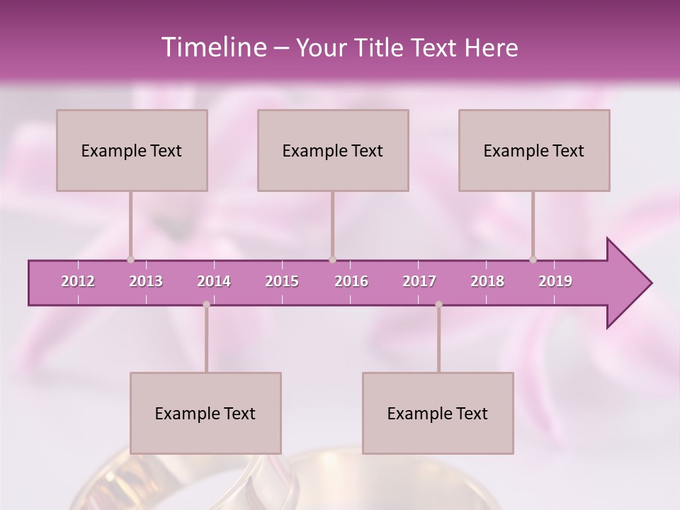 Two Gold Wedding Rings Sitting On Top Of A Table PowerPoint Template