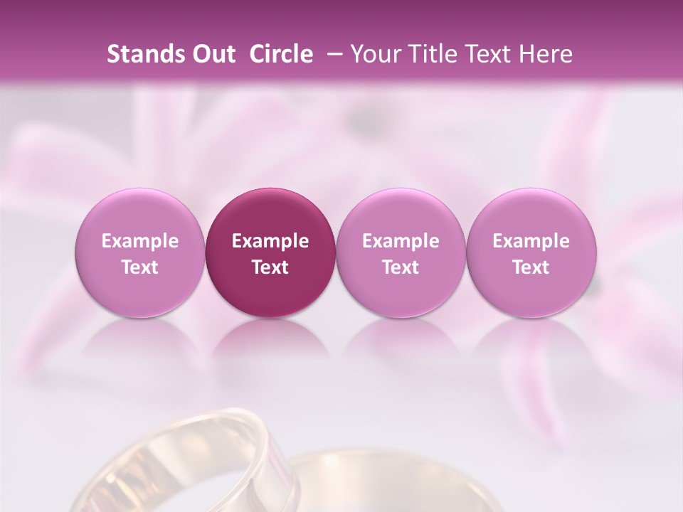 Two Gold Wedding Rings Sitting On Top Of A Table PowerPoint Template