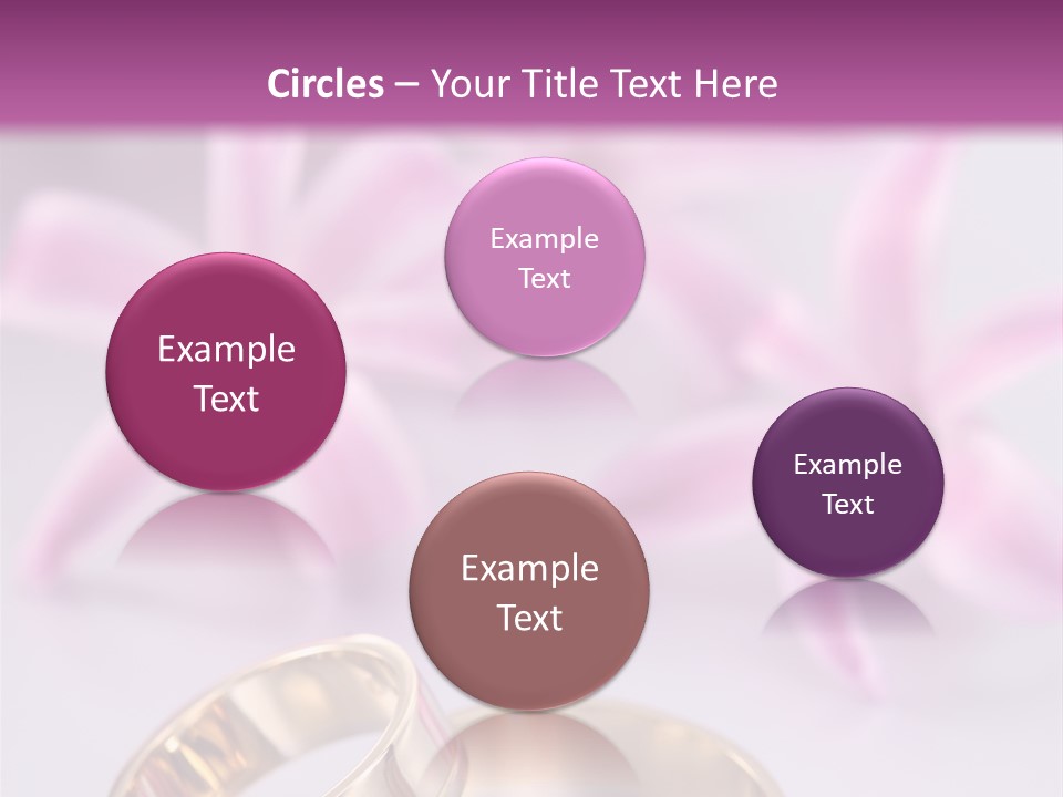 Two Gold Wedding Rings Sitting On Top Of A Table PowerPoint Template