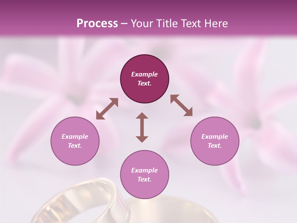 Two Gold Wedding Rings Sitting On Top Of A Table PowerPoint Template