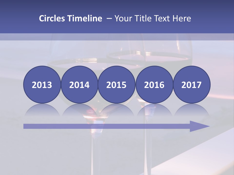 Two Glasses Of Red Wine Sitting On A Ledge Over Looking The Beach, Ocean And Beautiful Sunset. PowerPoint Template