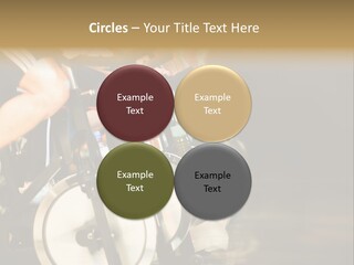 Active Lifestyle - Men & Women Pedalling On Stationery Bikes - Shallow Dof Focus On The Second Bike PowerPoint Template