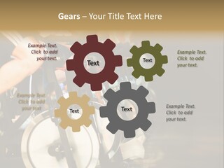 Active Lifestyle - Men & Women Pedalling On Stationery Bikes - Shallow Dof Focus On The Second Bike PowerPoint Template