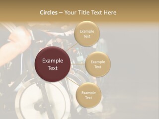 Active Lifestyle - Men & Women Pedalling On Stationery Bikes - Shallow Dof Focus On The Second Bike PowerPoint Template